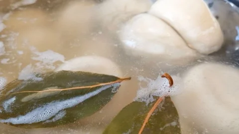 Bay leaf in broth for flavor Video stock 120380671