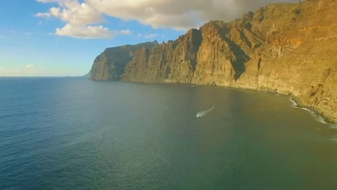 A bay in the ocean surrounded by giant rocks Stock Footage 73875698