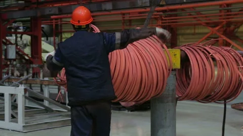 Bay red copper wire work takes a load Stock Footage 103104316