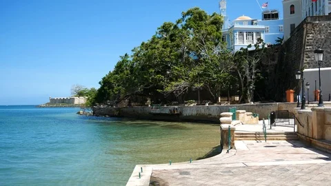 Bay side of Paseo La Princesa - Governor's mansion on top of the city wall. Stock Footage 90534214