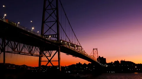 Bay at sunset with Hercílio Luz bridge in the background, in Florianópolis, Stock Footage 129326267