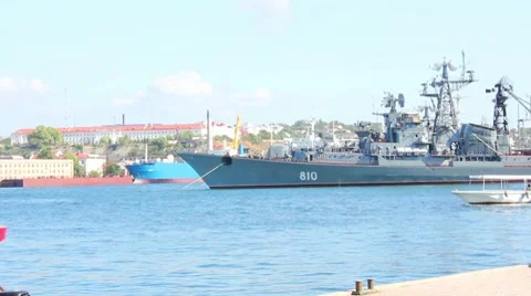 Bay with warship Stock Footage 8525490