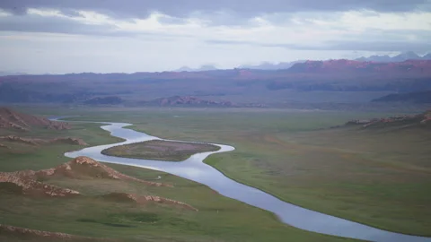 Bayanbulak Mountain Range and Kaidu River at Blue Hour Dusk Stock Footage 343064756