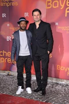 Bayerischer Filmpreis 2016 Ankunft - München Eric Kabongo ,und Simon Verho.. Stock Photos