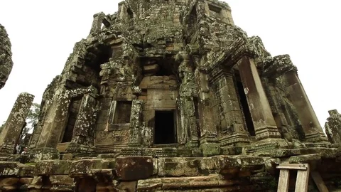 Bayon temple central tower smooth tilt shot Stock Footage 76381728