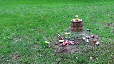 BB Gun rises and shoots the pop can Stock Footage 95905964