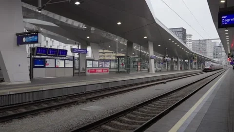 BB Train approaching Vienna Main Station. Graffiti on modern Austrian Train Stock Footage 231226686