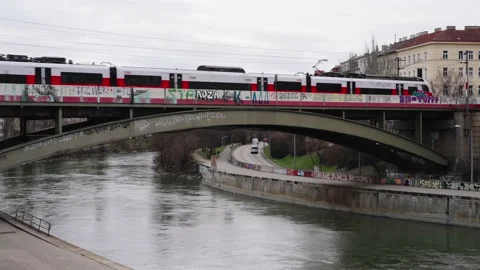 BB Train crossing Bridge over Danube Canal in Vienna Stock Footage 231225829