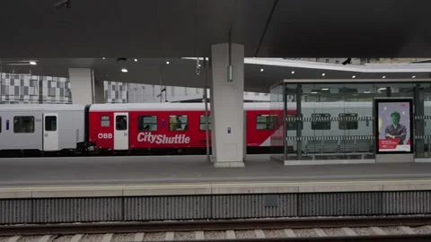 BB Train departing Vienna Central Station. Empty Platform in Vienna Station Stock Footage 231226151