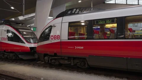 BB Train at Vienna Main Station. Commuter Train stopping at station Stock Footage 231226693