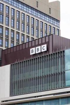 BBC logo on the modern facade of a broadcasting house. London, UK, 22 June 2024 Stock Photos
