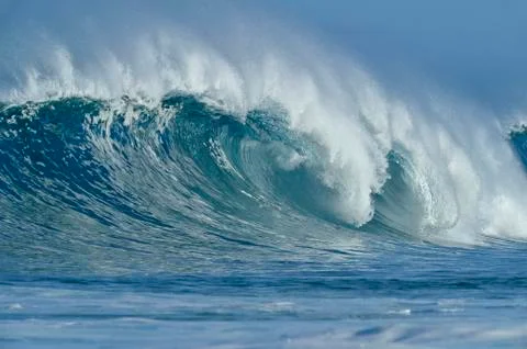 BBig dramatic wave on a sunny day in the Pacific Ocean at Oahu, Hawaii, USA Stock Photos