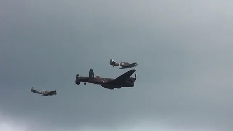 BBMF Lancaster Hurricane Spitfire formation low pass Stock Footage 83598958