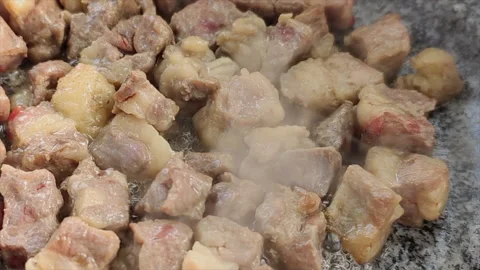 Bbq Beef Fried in Stone Pot During an Outdoor Dining Stock Footage 165635121