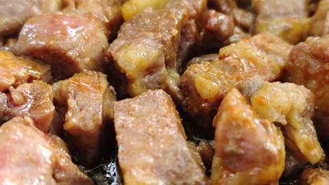 Bbq Beef Fried in Stone Pot During an Outdoor Dining Stock Footage 165635140