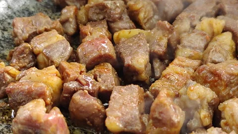 Bbq Beef Fried in Stone Pot During an Outdoor Dining Stock Footage 165635159