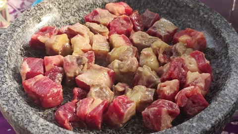 Bbq Beef Fried in Stone Pot During an Outdoor Dining Stock Footage 165638953