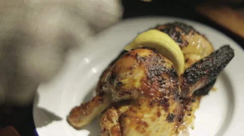 BBQ Chicken Garnished with Lemon Video stock 68978223