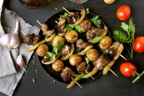 Bbq from chicken liver, potato and bell pepper Stock Photos