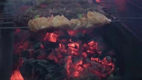 BBQ close up bonfire flames of camping fire, Super slow motion burning firewood. Vidéo 121580608