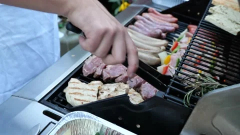 BBQ Close-up shot. Different types of meat and sausages on a bbq grill. Video stock 225726689