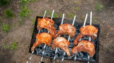 BBQ cooking Stock Photos
