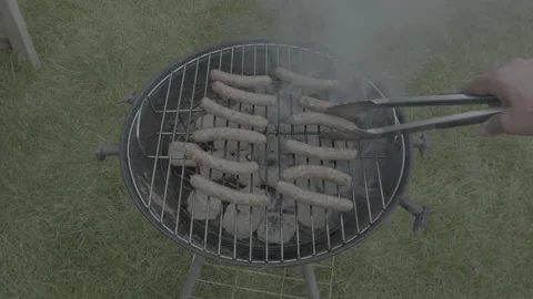 BBQ cooking Sausages on a Barbeque 動画素材 139329332