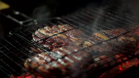 Bbq on fire in the night Video stock 64053812