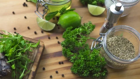 Bbq fish with fresh vegetable and seasoning on wooden table background. Food Stock Footage 104564471