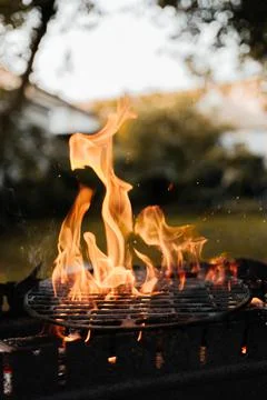 Bbq grill fire on backyard. Selective focus Stock Photos