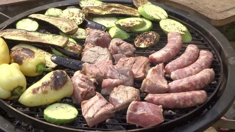 BBQ grill meat and vegetables on grillplace - bbq Stock Footage 109330409