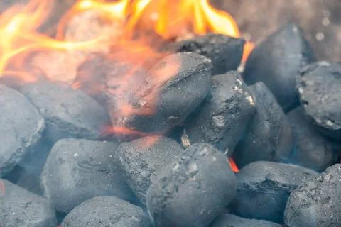 BBQ Grill Pit With Glowing And Flaming Hot Charcoal Briquettes, Food Backgrou Stock Photos