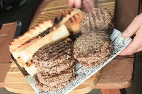 A BBQ with Hamburger, Bread and hot dog Stock Photos