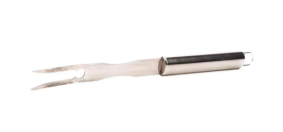  BBQ large fork. BBQ large fork. Isolated on a white background. Copyright... Foto stock