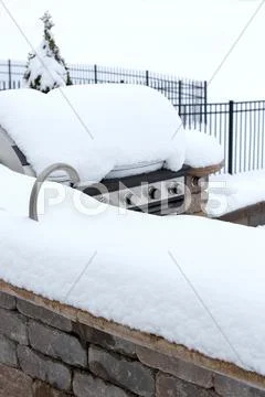 Bbq In Outdoor Kitchen Buried Beneath Winter Snow