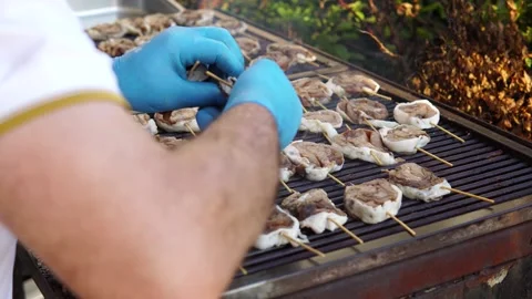 BBQ party, grill buffet restaurant. Sliced meat, beef tongue, grilled on bamb Stock Footage 199101992