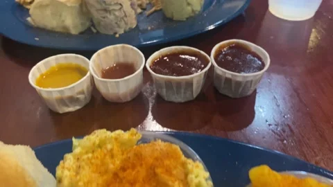 BBQ pulled pork, Mac and cheese, potato salad, dinner roll, BBQ chicken Stock Footage 239429533