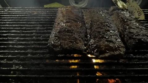 BBQ Rack of Ribs Slow Motion with Flame at Fair (Part 1) Stock Footage 219841306