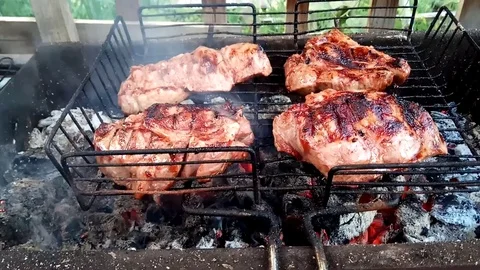 BBQ Roast Pork Steak Close-up On Hot Grill Stock Footage 77198587