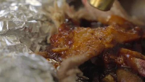 BBQ sauce caramelized over pulled pork close up Stock Footage 244689227