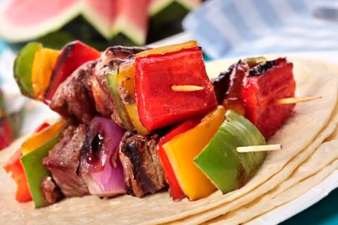 BBQ skewer on the picnic table Stock Photos