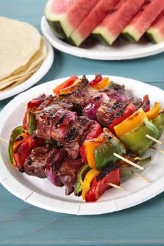 BBQ skewer on the picnic table Stock Photos