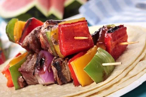 BBQ skewer on the picnic table Stock Photos