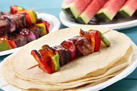 BBQ skewer on the picnic table Stock Photos