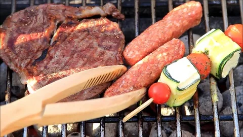 BBQ time with meat vegetables and sheep cheese Stock Footage