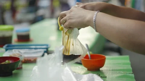 BBQ Vinegar and Fish Sauce Preparation at Street Stall in Cebu City, Philippines Stock Footage 335496344