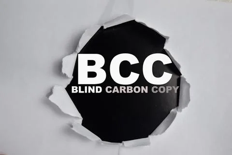 BCC - blind carbon copy Text written in torn paper Stock Photos
