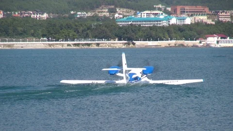 Be-103 light amphibious aircraft floats like boat at sea in Gelendzhin Bay. Stock Footage 123210590
