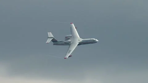 Be-200ES amphibious aircraft performs aerobatics over waters of Gelendzhik Bay. Stock Footage 134032432