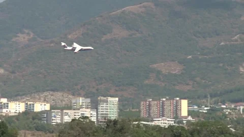 Be-200ES multi-purpose amphibious aircraft lands on water in waters of Bay. Stock Footage 132979977
